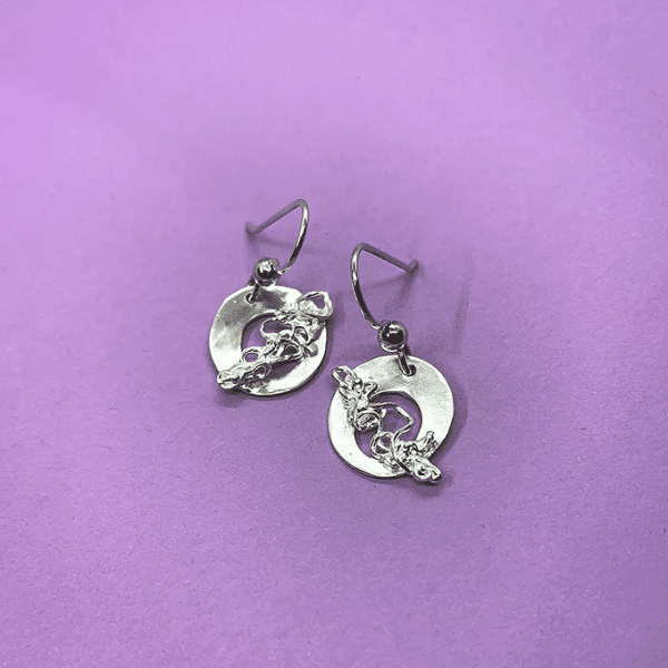 nest circular earrings