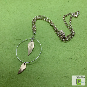 leaf collection necklace with circular